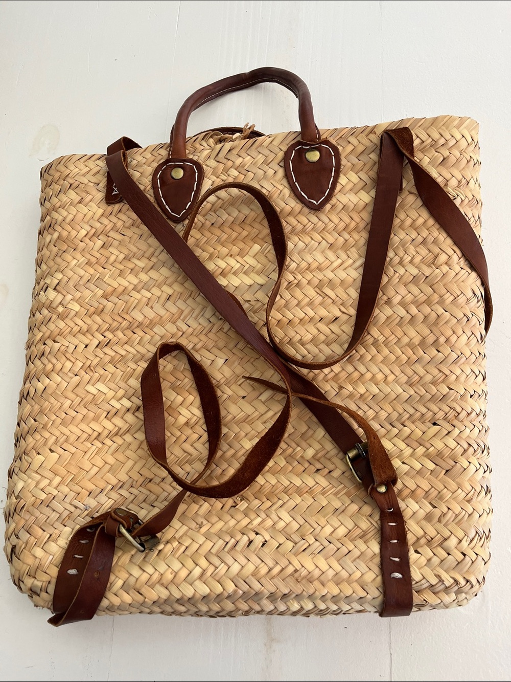 Woven Straw Tote Backpack with Brown Leather Trim
